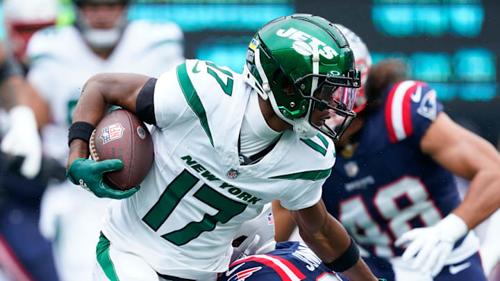 New York Jets wide receiver Garrett Wilson (17) runs with the ball against the New England Patriots in the first half of a regular season game at MetLife Stadium on Sunday, Sept. 24, 2023, in East Rutherford.