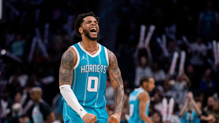 Mar 8, 2025; Charlotte, North Carolina, USA; Charlotte Hornets forward Miles Bridges (0) celebrates after taking the lead against the Brooklyn Nets during the fourth quarter at Spectrum Center. Mandatory Credit: Scott Kinser-Imagn Images