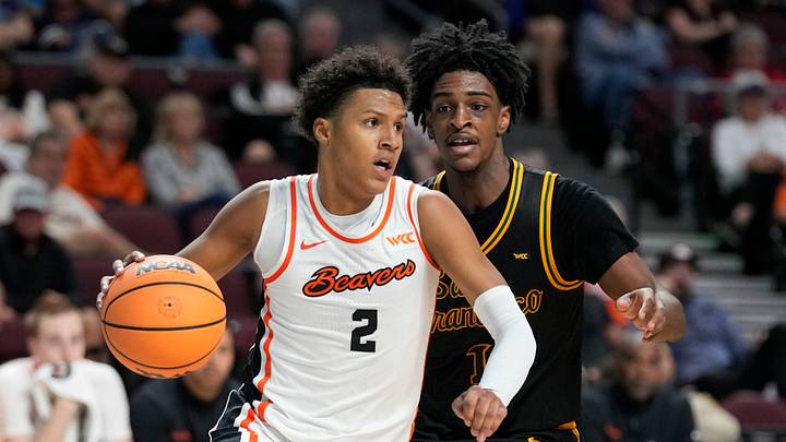 March 8, 2026; Las Vegas, NV, USA; Oregon State Beavers guard Josiah Lake II (2) dribbles the basketball against San Francisco Dons center Saba Gigiberia (10) during the second half at Orleans Arena. Mandatory Credit: Kyle Terada-Imagn Images March 8, 2026; Las Vegas, NV, USA; Oregon State Beavers guard Josiah Lake II (2) dribbles the basketball against San Francisco Dons center Saba Gigiberia (10) during the second half at Orleans Arena. Mandatory Credit: Kyle Terada-Imagn Images