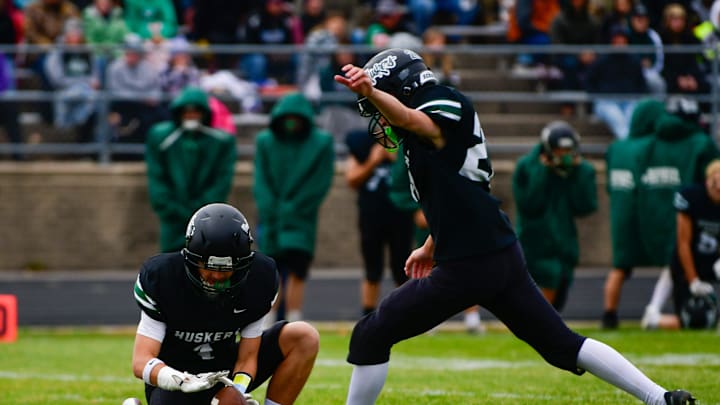 Holdingford football sophomore Tatum Manske kicks during the section semifinal versus Staples-Motley on Oct. 25, 2025. The Huskers won the home game 41-0