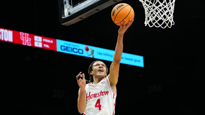 Nov 25, 2025; Las Vegas, NV, USA; Houston Cougars guard Kingston Flemings (4) goes for a layup in a 2025 Players Era Festival group play game against the Tennessee Volunteers during the first half at MGM Grand Garden Arena. Mandatory Credit: Stephen R. Sylvanie-Imagn Images