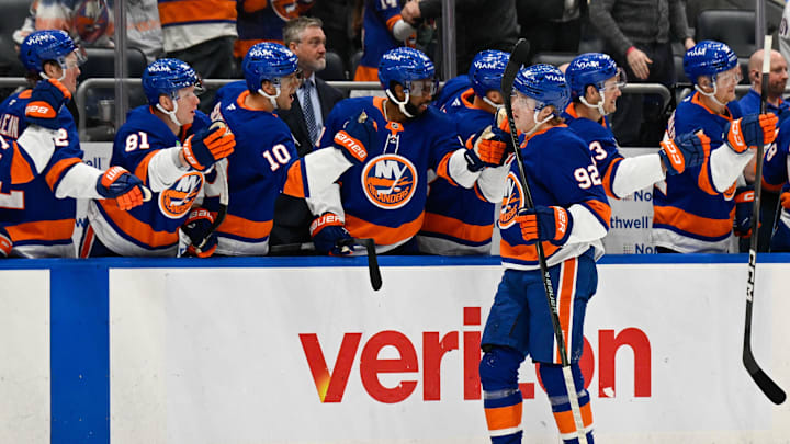 Mar 14, 2026; Elmont, New York, USA; New York Islanders right wing Simon Holmstrom (92) celebrates his second goal against the Calgary Flames during the first period at UBS Arena. Mandatory Credit: Dennis Schneidler-Imagn Images Mar 14, 2026; Elmont, New York, USA; New York Islanders right wing Simon Holmstrom (92) celebrates his second goal against the Calgary Flames during the first period at UBS Arena. Mandatory Credit: Dennis Schneidler-Imagn Images