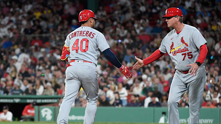 May 12, 2023; Boston, Massachusetts, USA; St. Louis Cardinals designated hitter Willson Contreras (40) celebrates his homerun with third base coach Ron 'Pop' Warner (75) during the sixth inning against the Boston Red Sox at Fenway Park. Mandatory Credit: Eric Canha-Imagn Images May 12, 2023; Boston, Massachusetts, USA; St. Louis Cardinals designated hitter Willson Contreras (40) celebrates his homerun with third base coach Ron 'Pop' Warner (75) during the sixth inning against the Boston Red Sox at Fenway Park. Mandatory Credit: Eric Canha-Imagn Images