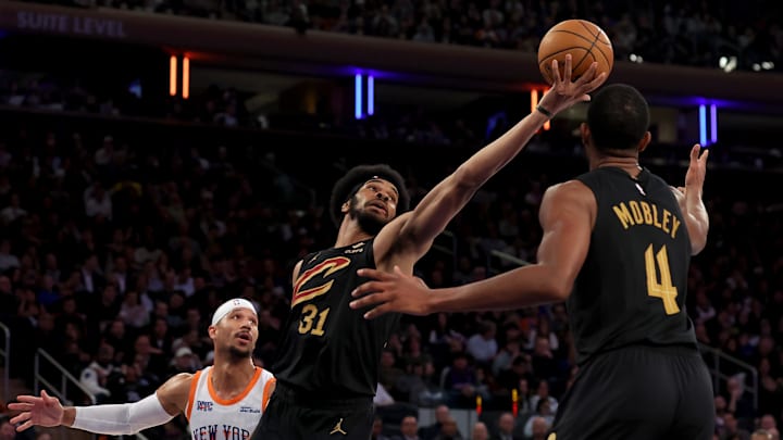 Apr 11, 2025; New York, New York, USA; Cleveland Cavaliers center Jarrett Allen (31) grabs a rebound against New York Knicks guard Josh Hart (3) in front of Cavaliers forward Evan Mobley (4) during the second quarter at Madison Square Garden. Mandatory Credit: Brad Penner-Imagn Images Apr 11, 2025; New York, New York, USA; Cleveland Cavaliers center Jarrett Allen (31) grabs a rebound against New York Knicks guard Josh Hart (3) in front of Cavaliers forward Evan Mobley (4) during the second quarter at Madison Square Garden. Mandatory Credit: Brad Penner-Imagn Images