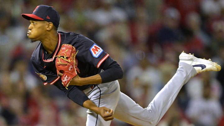 Apr 5, 2025; Anaheim, California, USA;Cleveland Guardians relief pitcher Triston McKenzie (24) delivers to the plate in the fifth inning against the Los Angeles Angels at Angel Stadium. 