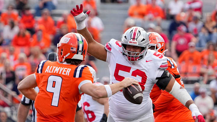 Ohio State Buckeyes defensive lineman Will Smith Jr. (53) pressures Illinois Fighting Illini quarterback Luke Altmyer (9) during the second half of the NCAA football game at Gies Memorial Stadium in Champaign on Oct. 11, 2025. Ohio State won 34-16. Ohio State Buckeyes defensive lineman Will Smith Jr. (53) pressures Illinois Fighting Illini quarterback Luke Altmyer (9) during the second half of the NCAA football game at Gies Memorial Stadium in Champaign on Oct. 11, 2025. Ohio State won 34-16.
