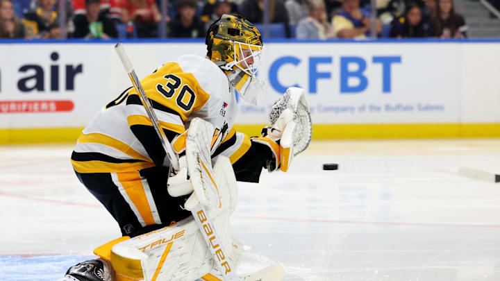 Sep 21, 2024; Buffalo, New York, USA; Pittsburgh Penguins goalie Joel Blomqvist (30) looks to make a save during the second period against the Buffalo Sabres at KeyBank Center. Mandatory Credit: Timothy T. Ludwig-Imagn Images Sep 21, 2024; Buffalo, New York, USA; Pittsburgh Penguins goalie Joel Blomqvist (30) looks to make a save during the second period against the Buffalo Sabres at KeyBank Center. Mandatory Credit: Timothy T. Ludwig-Imagn Images