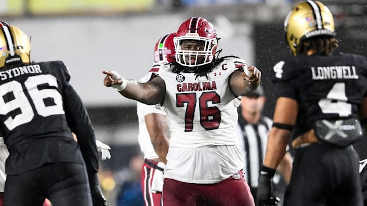 Nov 9, 2024; Nashville, Tennessee, USA; South Carolina Gamecocks offensive lineman Torricelli Simpkins III (76) points to Vanderbilt Commodores linebacker Bryan Longwell (4) and defensive lineman Khordae Sydnor (96) during the second half at FirstBank Stadium. Mandatory Credit: Steve Roberts-Imagn Images Nov 9, 2024; Nashville, Tennessee, USA; South Carolina Gamecocks offensive lineman Torricelli Simpkins III (76) points to Vanderbilt Commodores linebacker Bryan Longwell (4) and defensive lineman Khordae Sydnor (96) during the second half at FirstBank Stadium. Mandatory Credit: Steve Roberts-Imagn Images