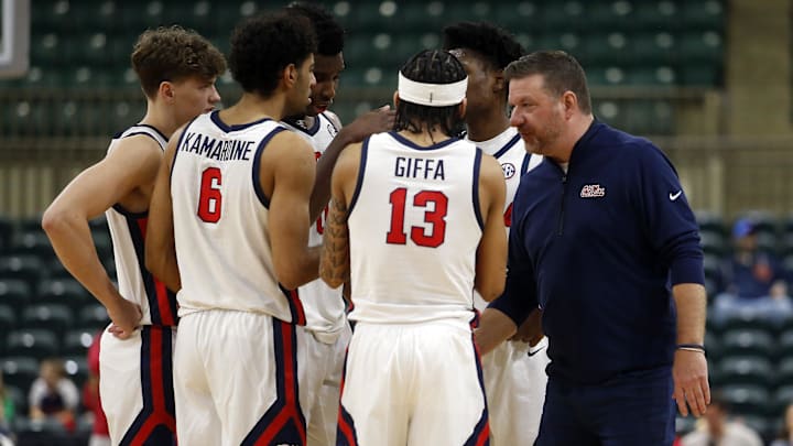 Dec 17, 2025; Tupelo, Mississippi, USA; Mississippi Rebels head coach Chris Beard huddles with his team during a timeout during the second half against the Alabama A&M Bulldogs at Cadence Bank Arena. Mandatory Credit: Petre Thomas-Imagn Images Dec 17, 2025; Tupelo, Mississippi, USA; Mississippi Rebels head coach Chris Beard huddles with his team during a timeout during the second half against the Alabama A&M Bulldogs at Cadence Bank Arena. Mandatory Credit: Petre Thomas-Imagn Images
