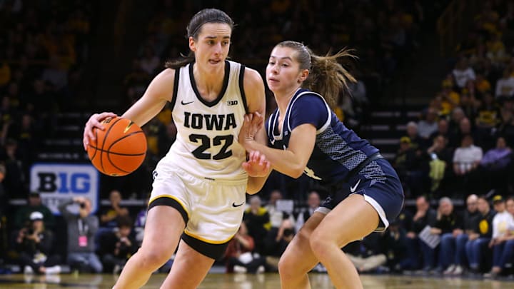Iowa   s Caitlin Clark (22) dribbles against Penn State