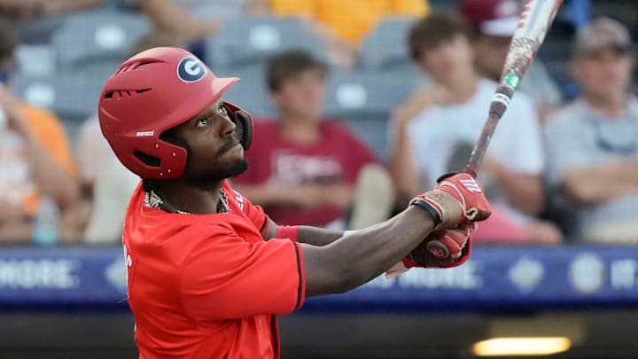 May 21, 2025; Hoover, AL, USA; Georgia left fielder Tre Phelps (1) follows through as he connects with a pitch during the game with Oklahoma in the second round of the SEC Baseball Tournament at the Hoover Met.