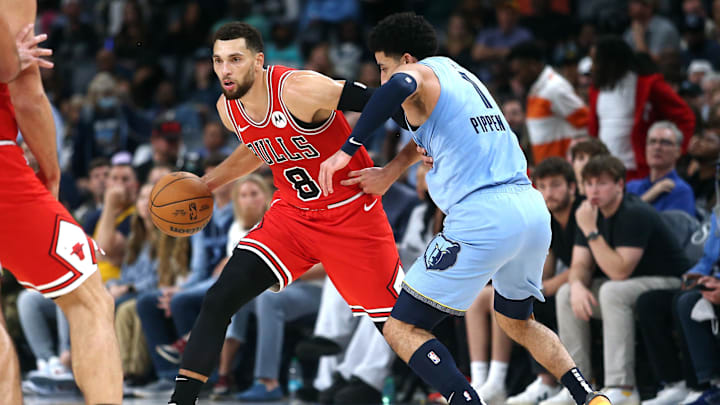  Chicago Bulls guard Zach LaVine (8) dribbles as Memphis Grizzlies guard Scotty Pippen Jr. (1) defends during the second half at FedExForum. Mandatory Credit: Petre Thomas-Imagn Images