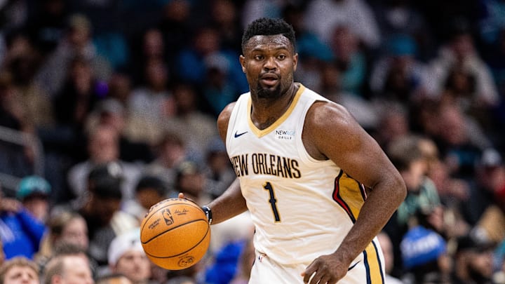 Jan 25, 2025; Charlotte, North Carolina, USA; New Orleans Pelicans forward Zion Williamson (1) brings the ball up court against the Charlotte Hornets during the fourth quarter at Spectrum Center. Mandatory Credit: Scott Kinser-Imagn Images
