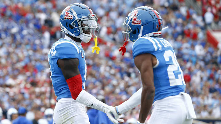 Sep 28, 2024; Oxford, Mississippi, USA; Mississippi Rebels defensive back Trey Amos (9) reacts with defensive back Jadon Canady (28) after a defensive stop during the first half against the Kentucky Wildcats at Vaught-Hemingway Stadium. Mandatory Credit: Petre Thomas-Imagn Images