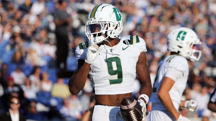 Oct 19, 2024; Annapolis, Maryland, USA; Charlotte 49ers wide receiver O'Mega Blake (9) celebrates after scoring a touchdown during the first half against the Navy Midshipmen at Navy-Marine Corps Memorial Stadium. Mandatory Credit: Daniel Kucin Jr.-Imagn Images