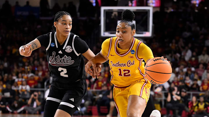 Mar 24, 2025; Los Angeles, California, USA; USC Trojans guard JuJu Watkins (12) drives to the basket past Mississippi State Bulldogs guard Jerkaila Jordan (2) during the first quieter of an NCAA Tournament second round game at Galen Center. Mandatory Credit: Robert Hanashiro-Imagn Images Mar 24, 2025; Los Angeles, California, USA; USC Trojans guard JuJu Watkins (12) drives to the basket past Mississippi State Bulldogs guard Jerkaila Jordan (2) during the first quieter of an NCAA Tournament second round game at Galen Center. Mandatory Credit: Robert Hanashiro-Imagn Images