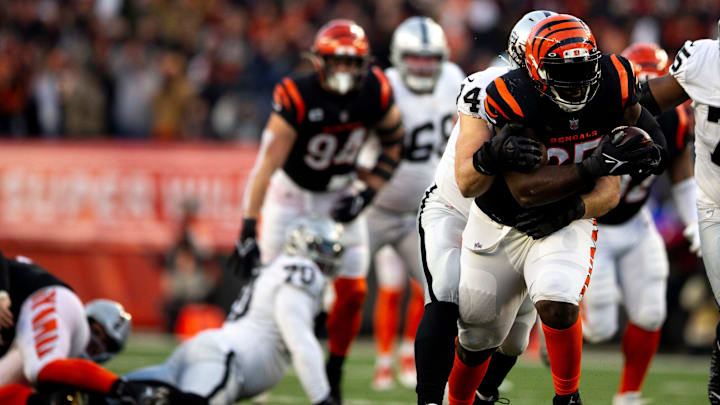 Las Vegas Raiders offensive tackle Kolton Miller (74) tackles Cincinnati Bengals defensive tackle Larry Ogunjobi (65) after he recovers a fumble forced by Cincinnati Bengals defensive end Trey Hendrickson (91) in the first half the AFC wild card game between the Cincinnati Bengals and the Las Vegas Raiders on Saturday, Jan. 15, 2022, at Paul Brown Stadium in Cincinnati.

Las Vegas Raiders At Cincinnati Bengals Playoff Ac 164