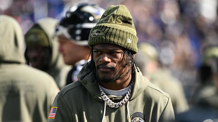 Oct 26, 2025; Baltimore, Maryland, USA; Baltimore Ravens quarterback Lamar Jackson (8) looks on from the sideline during the first quarter against the Chicago Bears at M&T Bank Stadium. Mandatory Credit: Tommy Gilligan-Imagn Images Oct 26, 2025; Baltimore, Maryland, USA; Baltimore Ravens quarterback Lamar Jackson (8) looks on from the sideline during the first quarter against the Chicago Bears at M&T Bank Stadium. Mandatory Credit: Tommy Gilligan-Imagn Images