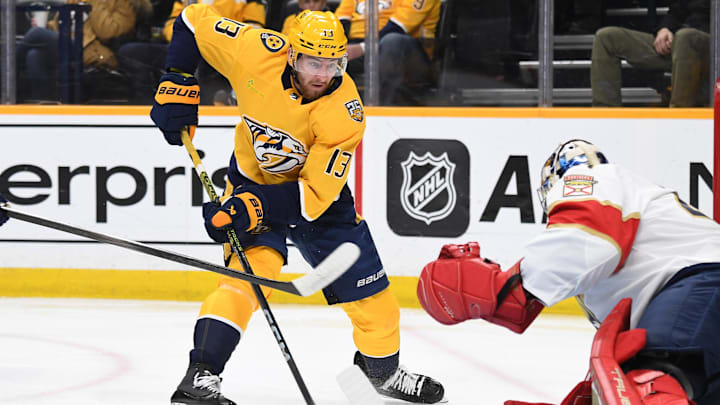Jan 22, 2024; Nashville, Tennessee, USA; Nashville Predators center Yakov Trenin (13) shoots the