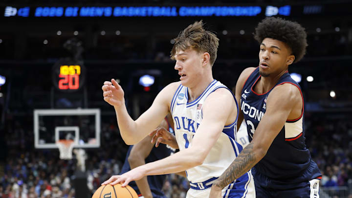 Duke Blue Devils guard Nikolas Khamenia (14) 