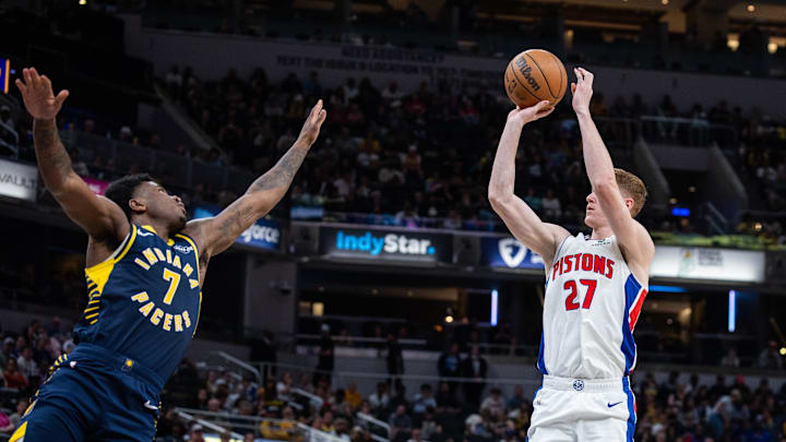 Apr 12, 2026; Indianapolis, Indiana, USA;  Detroit Pistons guard Kevin Huerter (27) shoots the ball while  Indiana Pacers guard Kam Jones (7) defends in the second half at Gainbridge Fieldhouse. Mandatory Credit: Trevor Ruszkowski-Imagn Images