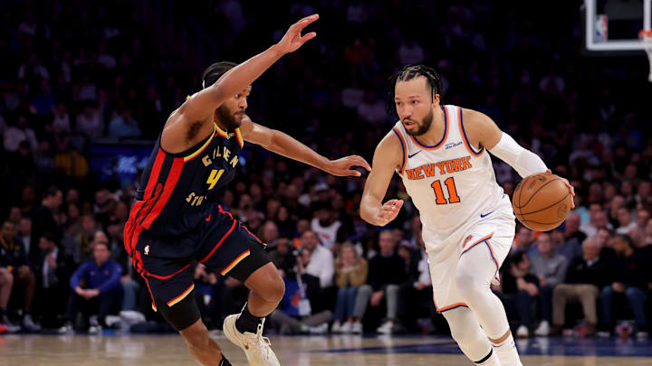 Mar 4, 2025; New York, New York, USA; New York Knicks guard Jalen Brunson (11) drives to the basket against Golden State Warriors guard Moses Moody (4) during the third quarter at Madison Square Garden. Mandatory Credit: Brad Penner-Imagn Images