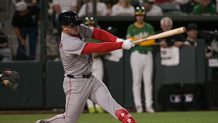 Sep 8, 2025; West Sacramento, California, USA; Boston Red Sox third baseman Alex Bregman (2) hits an rbi single against the Athletics during the fifth inning at Sutter Health Park. 