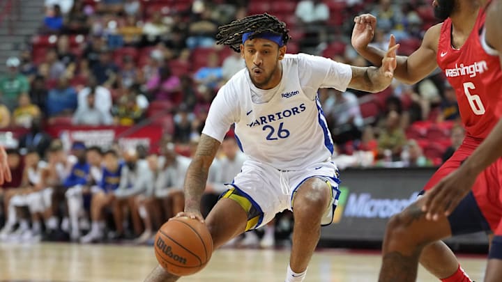 Jul 17, 2022; Las Vegas, NV, USA; Golden State Warriors forward Alex Morales (26) dribbles against the Washington Wizards during a NBA Summer League game at Thomas & Mack Center. Mandatory Credit: Stephen R. Sylvanie-Imagn Images