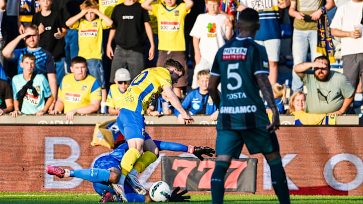 Alfie Devine in action against Royal Antwerp 