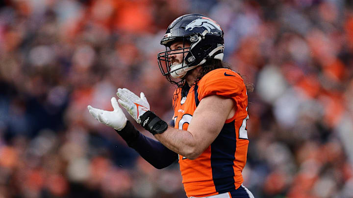 Dec 31, 2023; Denver, Colorado, USA; Denver Broncos linebacker Alex Singleton (49) reacts after a play against the Chargers. 