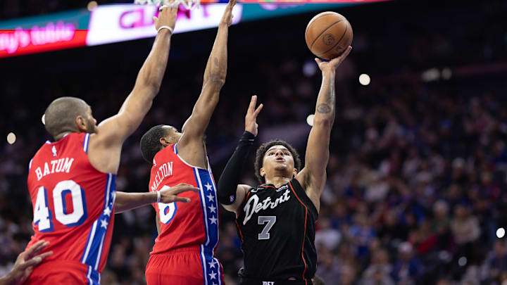 Dec 15, 2023; Philadelphia, Pennsylvania, USA; Detroit Pistons guard Killian Hayes (7) drives for a shot against Philadelphia 76ers guard De'Anthony Melton (8) during the third quarter at Wells Fargo Center. Mandatory Credit: Bill Streicher-USA TODAY Sports