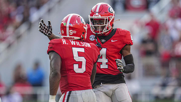 Oct 5, 2024; Athens, Georgia, USA; Georgia Bulldogs linebacker Raylen Wilson (5) and defensive back KJ Bolden (4) react after a play against the Auburn Tigers at Sanford Stadium. Mandatory Credit: Dale Zanine-Imagn Images Oct 5, 2024; Athens, Georgia, USA; Georgia Bulldogs linebacker Raylen Wilson (5) and defensive back KJ Bolden (4) react after a play against the Auburn Tigers at Sanford Stadium. Mandatory Credit: Dale Zanine-Imagn Images