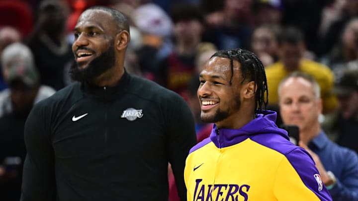 Los Angeles Lakers guard Bronny James, right, and forward LeBron James.