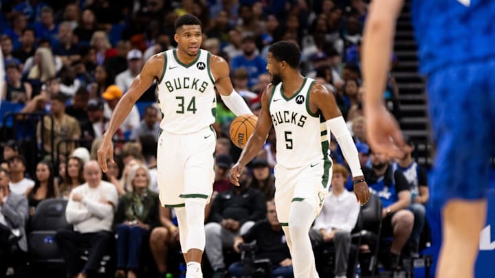 Nov 11, 2023; Orlando, Florida, USA; Milwaukee Bucks forward Giannis Antetokounmpo (34) talks with Milwaukee Bucks guard Malik Beasley (5) during the first half against the Orlando Magic at Amway Center. Mandatory Credit: Matt Pendleton-Imagn Images