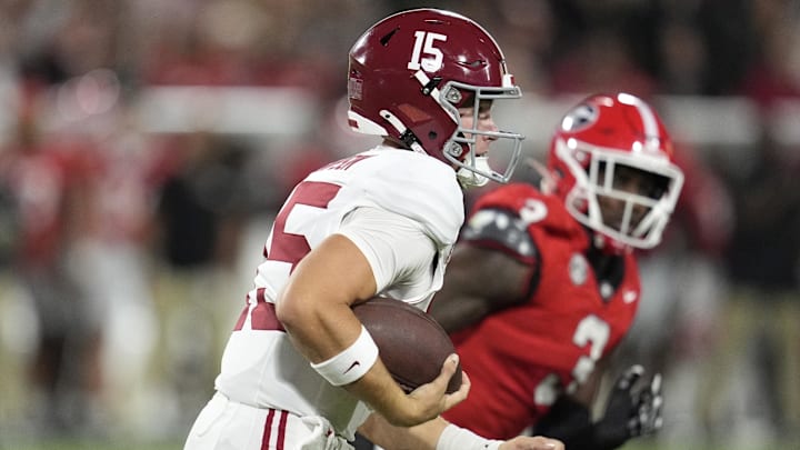 Sep 27, 2025; Athens, Georgia, USA; Alabama Crimson Tide quarterback Ty Simpson (15) runs against the Georgia Bulldogs in the first quarter at Sanford Stadium. Mandatory Credit: Dale Zanine-Imagn Images