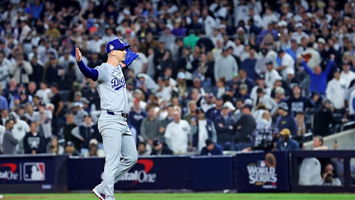 Oct 30, 2024; New York, New York, USA; Los Angeles Dodgers pitcher Walker Buehler (21) celebrates after beating the New York Yankees in game four to win the 2024 MLB World Series at Yankee Stadium. Mandatory Credit: Brad Penner-Imagn Images