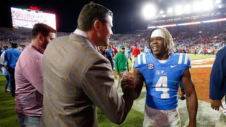 Oct 7, 2023; Oxford, Mississippi, USA; Mississippi Rebels athletic director Keith Carter reacts with running back Quinshon Judkins (4) after defeating the Arkansas Razorbacks at Vaught-Hemingway Stadium. Mandatory Credit: Petre Thomas-Imagn Images