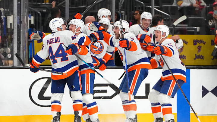 Nov 13, 2025; Las Vegas, Nevada, USA; New York Islanders center Jean-Gabriel Pageau (44) celebrates with team mates after scoring a short-handed goal against the Vegas Golden Knights during an overtime period to give the Islanders a 4-3 victory at T-Mobile Arena. Mandatory Credit: Stephen R. Sylvanie-Imagn Images Nov 13, 2025; Las Vegas, Nevada, USA; New York Islanders center Jean-Gabriel Pageau (44) celebrates with team mates after scoring a short-handed goal against the Vegas Golden Knights during an overtime period to give the Islanders a 4-3 victory at T-Mobile Arena. Mandatory Credit: Stephen R. Sylvanie-Imagn Images