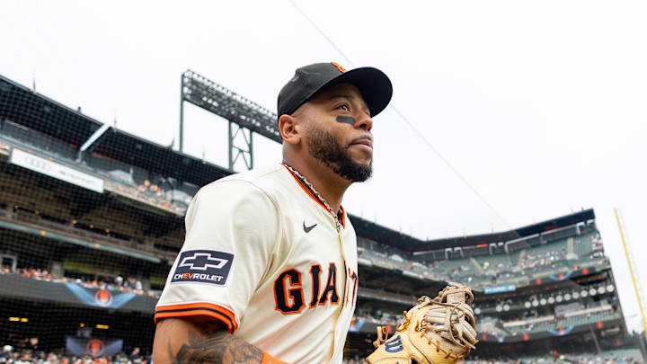 Aug 13, 2025; San Francisco, California, USA; San Francisco Giants first base Dominic Smith (7) takes the field before the game against the San Diego Padres at Oracle Park. Mandatory Credit: Bob Kupbens-Imagn Images Aug 13, 2025; San Francisco, California, USA; San Francisco Giants first base Dominic Smith (7) takes the field before the game against the San Diego Padres at Oracle Park. Mandatory Credit: Bob Kupbens-Imagn Images
