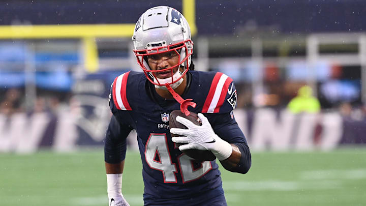 August 8, 2024; Foxborough, MA, USA;  New England Patriots cornerback Azizi Hearn (42) warms up before a game against the Carolina Panthers at Gillette Stadium. Mandatory Credit: Eric Canha-Imagn Images