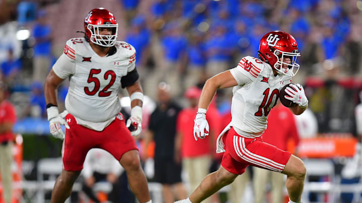 Utah Utes tight end Hunter Andrews (10) runs the ball against the UCLA Bruins during the second half at Rose Bowl. Utah Utes tight end Hunter Andrews (10) runs the ball against the UCLA Bruins during the second half at Rose Bowl.