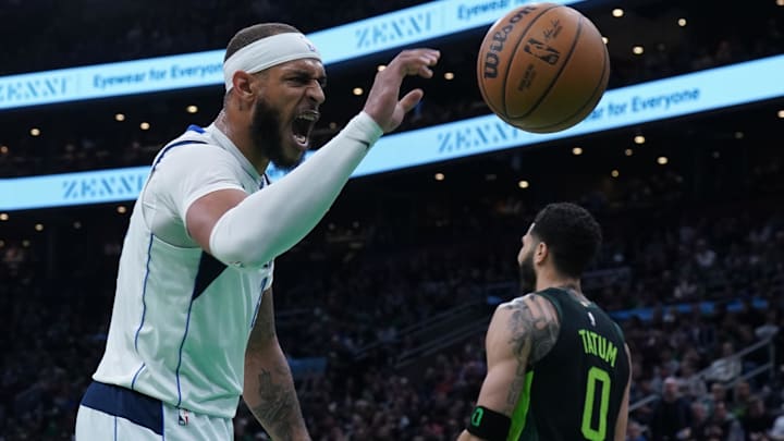 Feb 6, 2025; Boston, Massachusetts, USA; Dallas Mavericks center Daniel Gafford (21) reacts to a play against the Boston Celtics in the second quarter at TD Garden. Mandatory Credit: David Butler II-Imagn Images