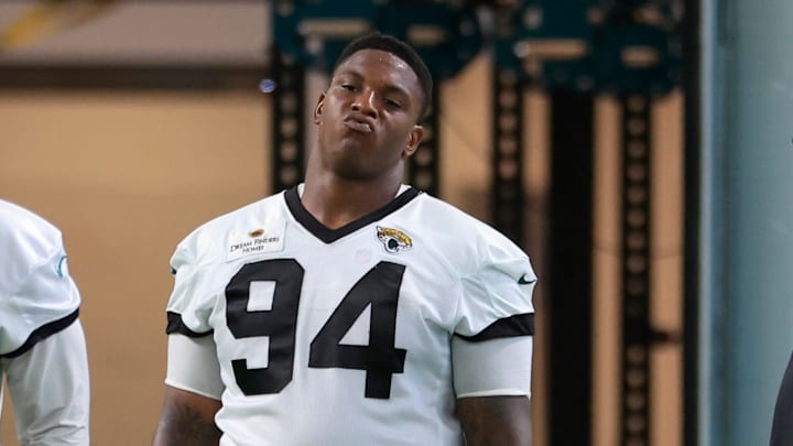 (EDITOR'S NOTE: Resubmitted with alternate crop.) Jacksonville Jaguars defensive tackle Maason Smith (94) looks on during the second day of a mandatory minicamp Tuesday, June 11, 2024 at EverBank Stadium's Miller Electric Center in Jacksonville, Fla.
