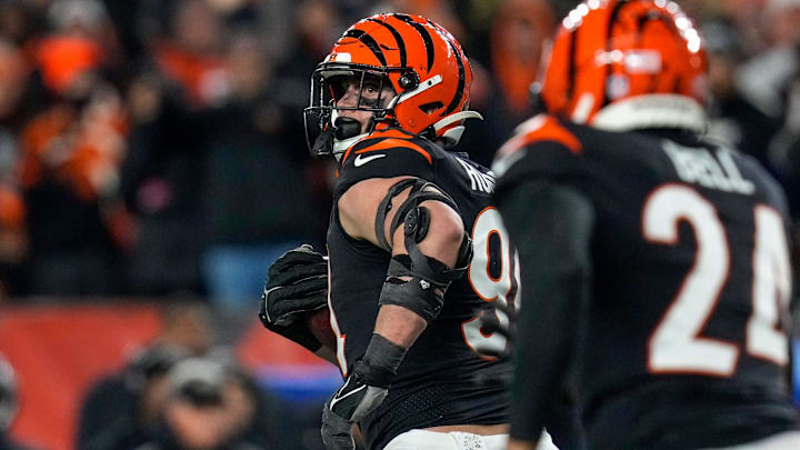 Cincinnati Bengals defensive end Sam Hubbard (94) breaks away with a stripped ball for a 98 yard go-ahead touchdown in the fourth quarter during an NFL wild-card playoff football game between the Baltimore Ravens and the Cincinnati Bengals, Sunday, Jan. 15, 2023, at Paycor Stadium in Cincinnati. The Bengals advanced to the Divisional round of the playoffs with a 24-17 win over the Ravens.

Baltimore Ravens At Cincinnati Bengals Afc Wild Card Jan 15 335

Syndication The Enquirer