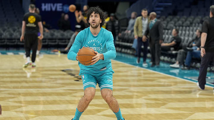 Jan 27, 2025; Charlotte, North Carolina, USA; Charlotte Hornets guard Vasilije Micic (22) shoots during pregame warm ups against the Los Angeles Lakers at the Spectrum Center. Mandatory Credit: Jim Dedmon-Imagn Images