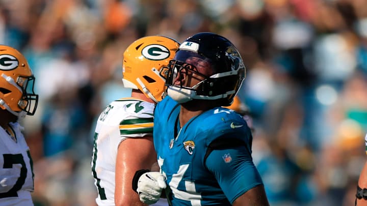 Jacksonville Jaguars defensive end Travon Walker (44) reacts to his sack on Green Bay Packers quarterback Malik Willis (2) during the fourth quarter of an NFL football matchup Sunday, Oct. 27, 2024 at EverBank Stadium in Jacksonville, Fla. The Packers edged the Jaguars 30-27 on a last-second field goal. [Corey Perrine/Florida Times-Union]