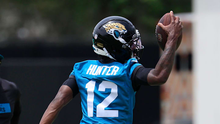Jacksonville Jaguars wide receiver Travis Hunter (12) catches a pass during a rookie minicamp at Miller Electric Center Saturday, May 10, 2025 in Jacksonville, Fla. [Corey Perrine/Florida Times-Union]