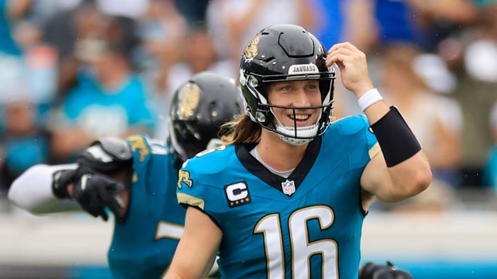 Jacksonville Jaguars quarterback Trevor Lawrence (16) smiles after wide receiver Christian Kirk (13), not shown, caught a reception during the fourth quarter of an NFL football matchup Sunday, Oct. 6, 2024 at EverBank Stadium in Jacksonville, Fla. The Jaguars edged the Colts on a field goal 37-34. [Corey Perrine/Florida Times-Union]