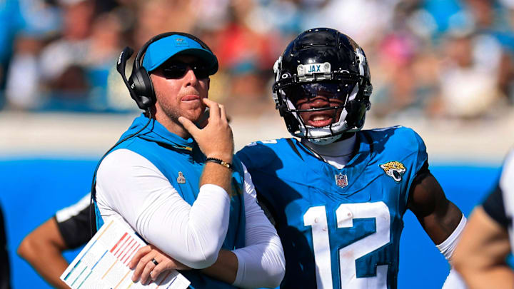 Jacksonville Jaguars head coach Liam Coen looks to the video scoreboard with wide receiver Travis Hunter (12) during the fourth quarter of an NFL football matchup, Sunday, Oct. 12, 2025, at EverBank Stadium in Jacksonville, Fla. The Seahawks defeated the Jaguars 20-12. Jacksonville Jaguars head coach Liam Coen looks to the video scoreboard with wide receiver Travis Hunter (12) during the fourth quarter of an NFL football matchup, Sunday, Oct. 12, 2025, at EverBank Stadium in Jacksonville, Fla. The Seahawks defeated the Jaguars 20-12.