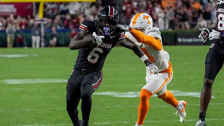 Oct 24, 2026; Columbia, South Carolina, USA;  South Carolina Gamecocks wide receiver Donovan Murph (6) tries to outrun Tennessee Volunteers defensive back Ty Redmond (4) during the second half at Williams-Brice Stadium.  Mandatory Credit: Jim Dedmon-Imagn Images